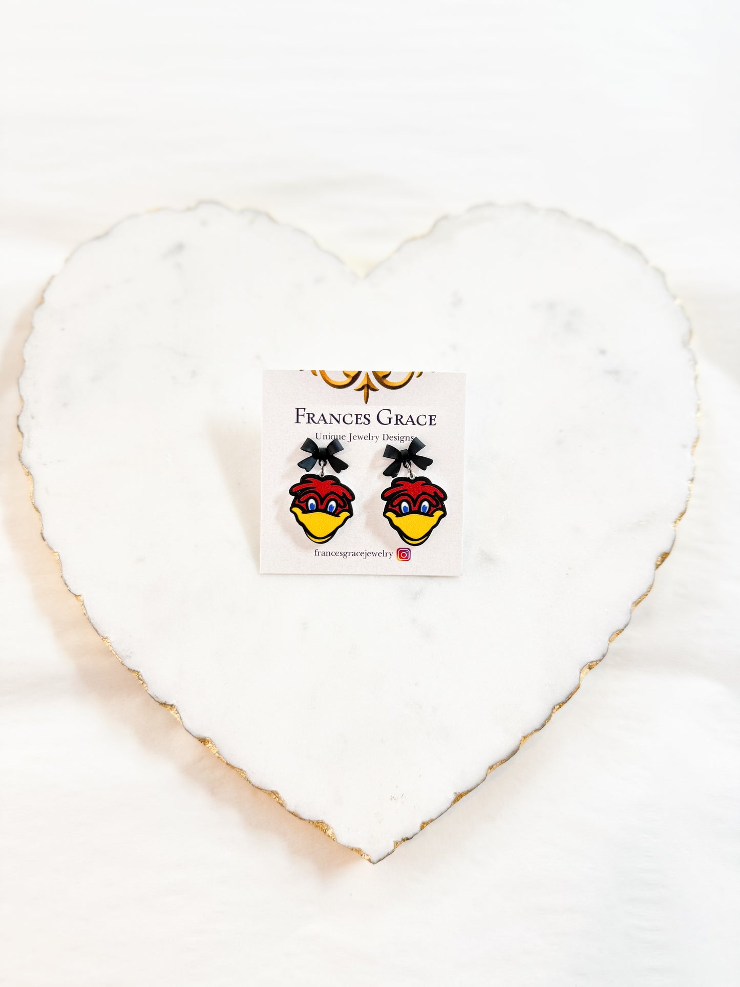 Cocky Earrings with Bow